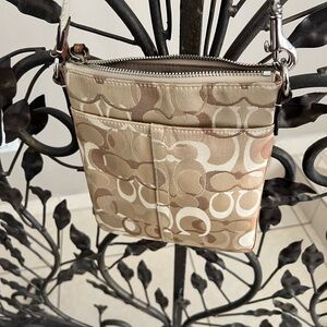Beautiful goldish camel Coach Crossbody bag great condition.